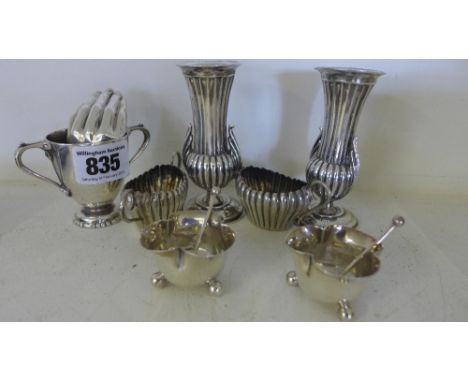 A pair of small silver ribbed and fluted vases - Height 9 cm, a pair of silver trefoil salts and spoons, a pair of fluted sal