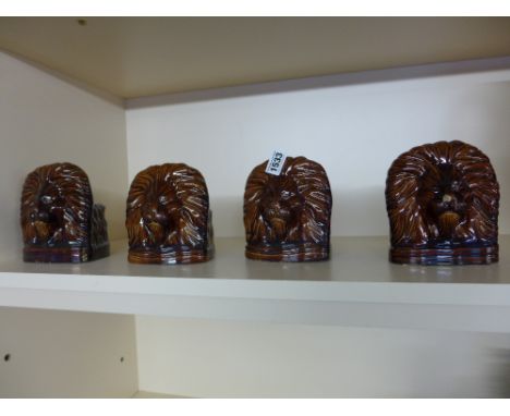 A set of four Victorian treacle glazed lion sash window steps 
Condition report: Some chips
