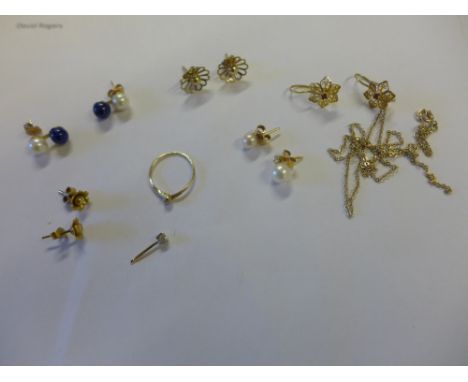 An assortment of jewellery - To include a diamond ear stud - a diamond set ring - gem and cultured pearl earrings and a belch