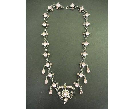 A late 19th/early 20th century topaz and seed pearl silver necklace - Length 41cms - Weight approx 36.5gms
Condition Report: 