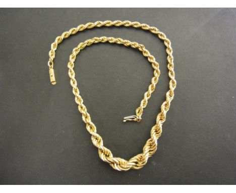 A 9ct gold rope-twist chain - Hallmarked London - Length 46cms - Weight approx 19.6gms
Condition Report: Good - With light su