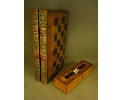 A 19th century back Gammon box containing box and Dominoes along with a Cribbage 