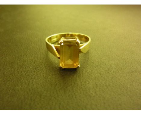 A citrine single-stone ring - Stamped 18ct - Ring size P - Weight approx 3.9gms
Condition Report: Good - With light surface s