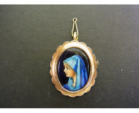 LIMOGES - CHERON - a pendant, depicting the profile of a lady within a scalloped surround - Tests as gold - Length 3.8cms - W
