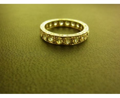 A spinel full-circle band ring - Stamped 9ct - Ring size P - Weight approx 3.5gms
Condition Report: Good to fair - With light