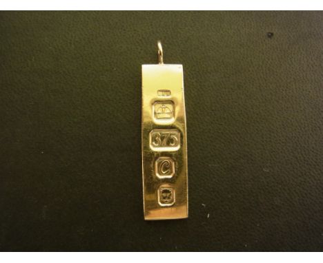 A 1970s 9ct gold ingot pendant - Length 4.8cms - Weight approx 14.5gms
Condition Report: Good - With light surface scratches.