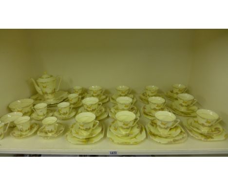 A Grafton china - Derwent tea, coffee service decorated with swallows including twelve trio's, six coffee cups and saucers, t