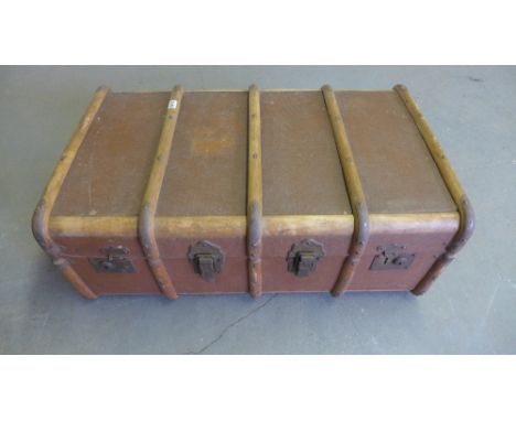 A canvas Bentwood travel trunk