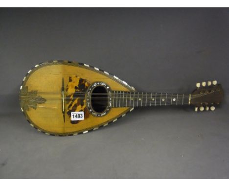 A rosewood, tortoiseshell and mother of pearl Mandolin bearing a label Achille Lanfranco E Figlio Napoli
Condition report:  D