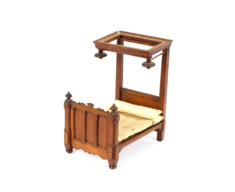 An oak miniature model of a half tester bed, 31cm long x 37cm high
