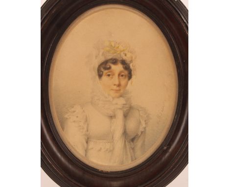 An oval portrait miniature of Mademoiselle&nbsp;Tasen, contained in ebonised frame