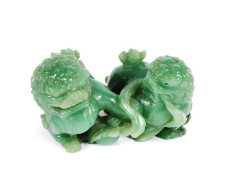 A well carved Chinese jade carving, of two temple dogs, 10cm
