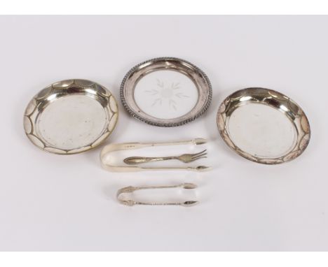 A white metal and glass shallow dish, with gadroon border; two plated shallow dishes; a pair of&nbsp; Georgian silver sugar t