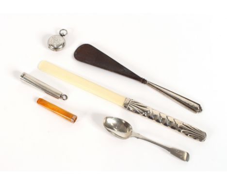 A Victorian silver sovereign case, Birmingham 1898, bearing monogram; an ivory and silver handled paper knife; a silver cigar
