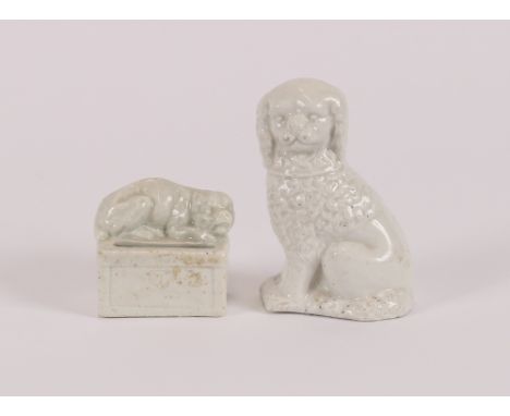 An 18th Century blanc de chine porcelain model of a pug dog, possibly Bow; together with an Antique blanc de chine figure of 