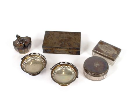 Two small silver swing handled bon bon baskets, London 1912; a silver mustard, Sheffield 1899; two silver topped tidy jars; a