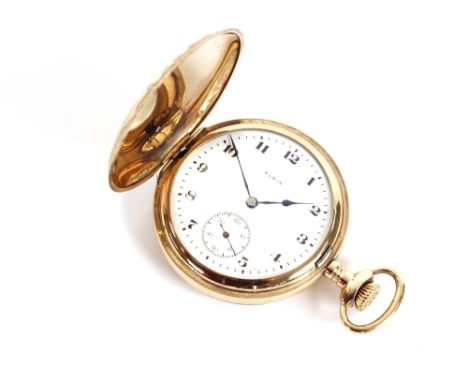 An American "Elgin" yellow metal Hunter pocket watch, with white enamel dial, the case with finely engraved foliate decoratio