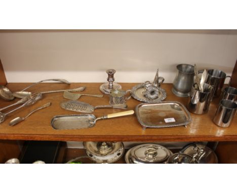 A small rectangular plate on copper salver; a plated fish slice; a crumb scoop; a basting spoon; a soup ladle; a stilton scoo