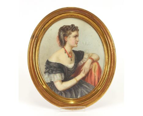 19th Century school, oval portrait study of a young beauty, possibly Spanish, unsigned watercolour, mounted in an oval gilt f