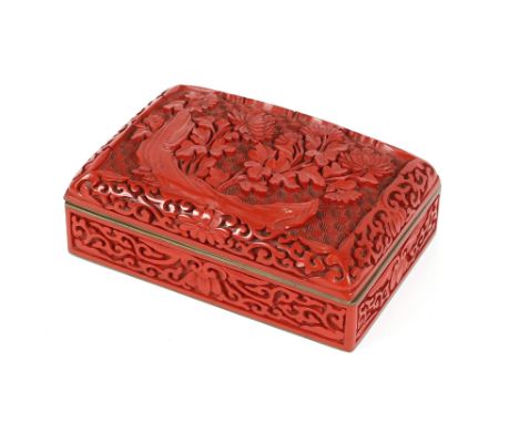 A finely carved cinnabar lacquer enamel and brass oblong box, 15cm