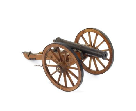 A wooden and iron model of a naval cannon, 33cm long; and another of an artillery field cannon, 39cm long overall, (2)