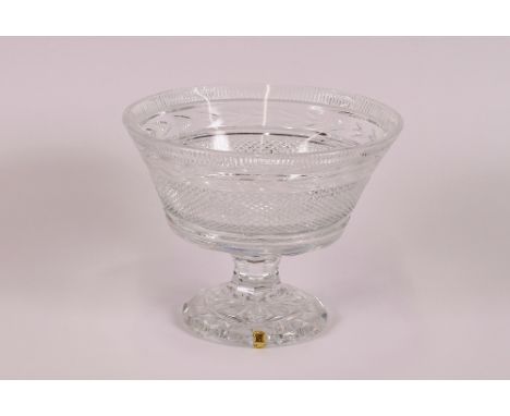 A Waterford cut glass pedestal fruit bowl, with hob-nail decoration, raised on a faceted column and spread foot, 25cm dia. x 