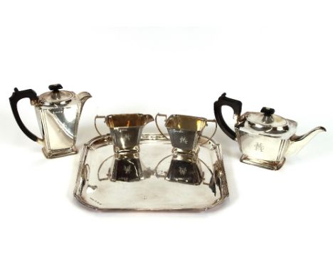 An Art Deco silver four piece tea/coffee service, and matching tray, Birmingham 1938, monogrammed, approx. 90ozs.