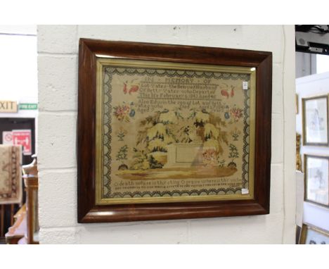 A Victorian rosewood framed pictorial tapestry sampler.