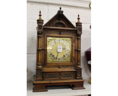 A good walnut cased mantle clock.