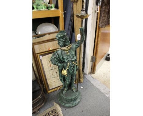 A large figural lamp base.