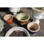 Three modern garden pots.