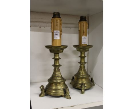 A pair of glass candlestick style lamps bases.