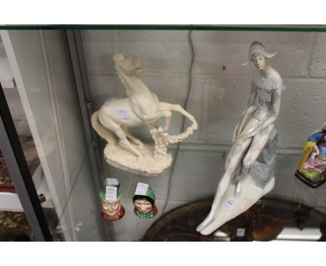 A large Nao figure of Harlequin together with a model of a horse and a pair of Beswick figural salt and peppers.