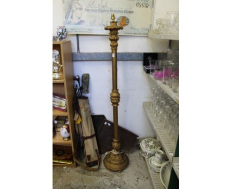 A giltwood standard lamp.