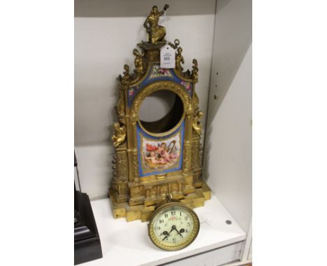 A 19th century ormolu mantle clock with Sevres style panels.