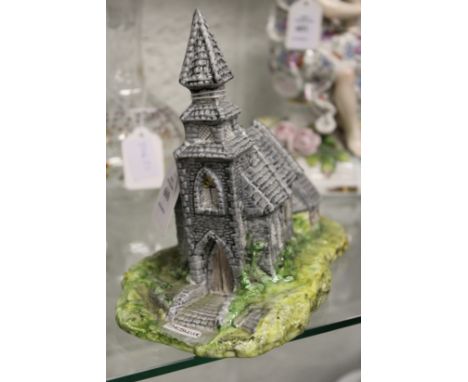 A Beswick model of a church.