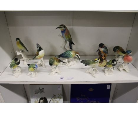 A group of Goebel bird ornaments.