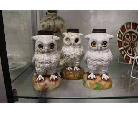 Three moulded owl lamp bases (one lacking eyes).