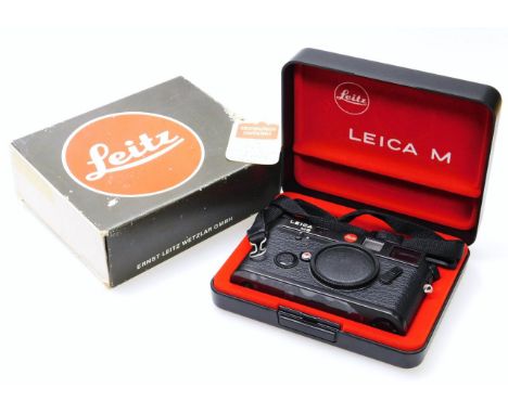A Leica Leitz M6 camera, 8cm high,  50mm, inner casing and outer box and strap.