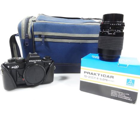 Camera equipment: a Praktica BX20 camera, 10cm high, in canvas case with other accessories (a quantity). 