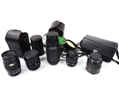 Various camera lenses, to include a Sigma 1:4.5-5.6 Auto Focus in outer case, 18cm wide, Minolta 1.4, Sigma F=35-135mm in out