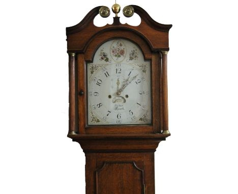 A early 19thC oak country longcase clock, with a mahogany crossbanding, the swan neck pedimented hood housing a painted arche