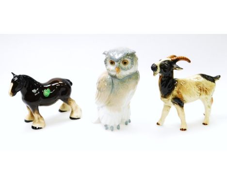 A 20thC Goebel figure of a goat, in cream colour way, blue marks beneath, 16cm high, Nao figure of an owl and a Melba shire h