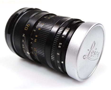A Leitz Leica camera lens Tele-ELMIRIT-M, 8.5cm high, in associated Nikon case.