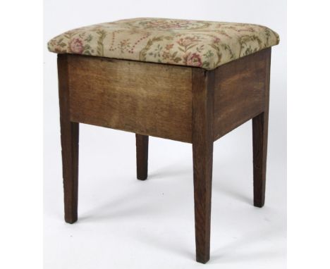 An early 20thC oak box commode, with material top and removable pot, 55cm H, 45cm W, 41cm D. 