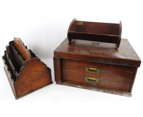 An early 20thC book slide, with carved dragon panels, 34cm wide, a desk tidy and an oak canteen (vacant).