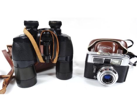 A Voigtlander Vito Cl camera, with Lanthar 2.8/50 lens, in brown leather case, 9cm high and a pair of Ross of London binocula