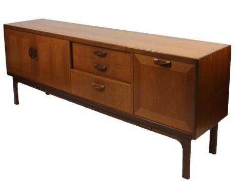 A retro teak G-Plan style light wood sideboard, of rectangular outline set with an arrangement of cupboards, fall front drawe