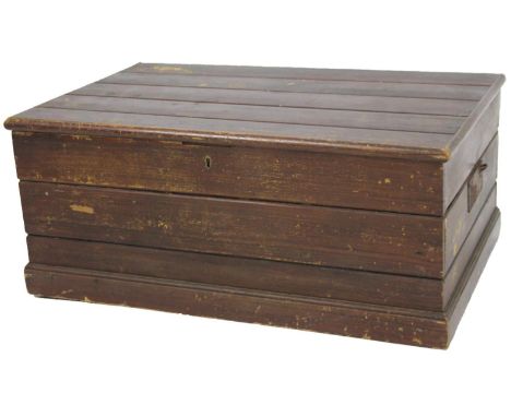 A late 19thC plank top pine tool chest, of rectangular outline with part fitted interior, partially stained, 30cm H, 77cm W, 