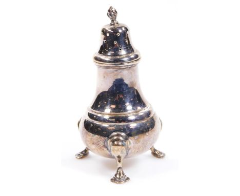 An Elizabeth II silver pepper pot, the domed lid with urn finial, with bulbous base on triple stylized hoof supports, Birming